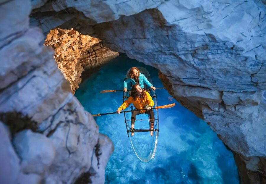 Pula: Night-Time Sea Kayaking Tour in Transparent Kayak - Looking through the glowing kayak floor