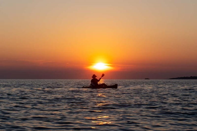 Pula:Sunset Kayak tour with glowing transparent kayak - Starting at Stoja Beach with a 15-Minute Safety Briefing