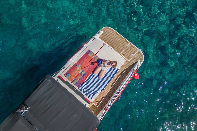 Rent a small boat without skipper - explore the islands and find hidden caves - Finding caves and stopping near the Blue Cave