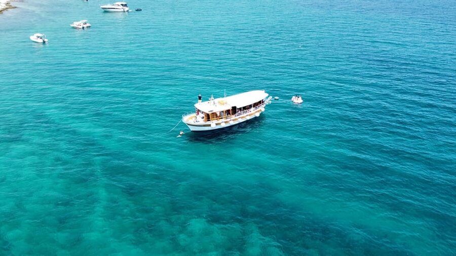Rovinj half-day cruise: swim stops, drinks & brunch included - Brunch on board, with drinks already covered