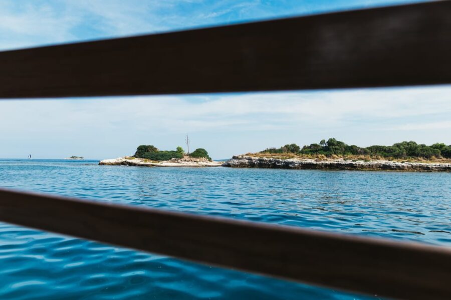 Rovinj: Sunset Cruise with Swim Stop, Drinks, and Fruits - Sunset From the Upper Deck