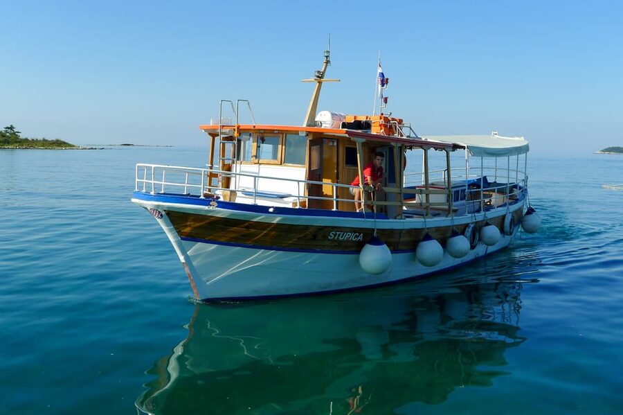 Rovinj: Sunset Cruise with Swim Stop, Drinks, and Fruits - What the Family Crew Adds