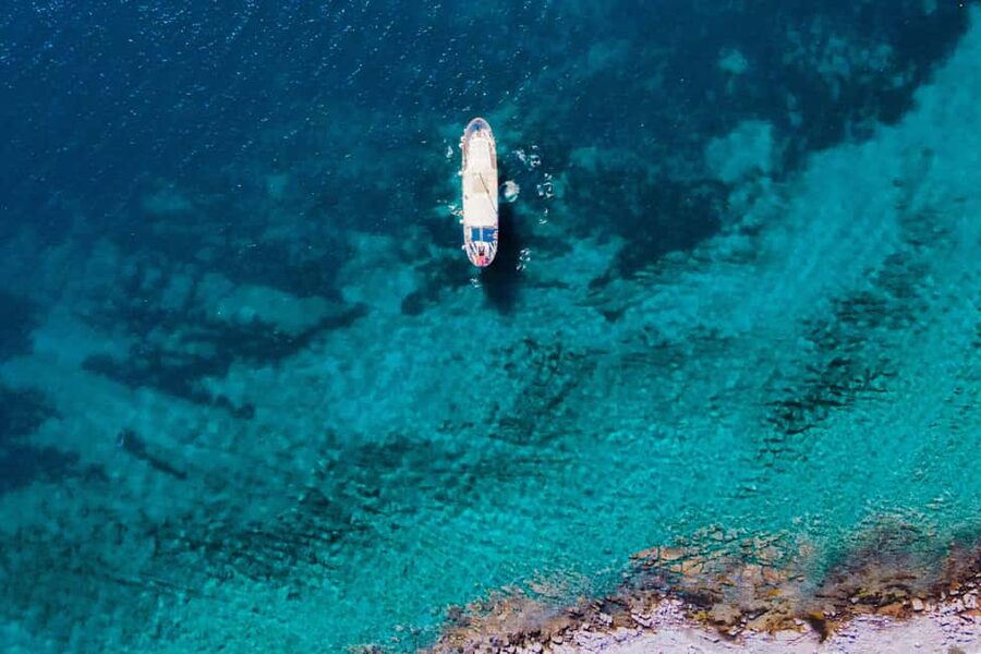 Split: Blue Lagoon Boat Party with Slide, Dj and After Party - Using the Wristband for the After-Party