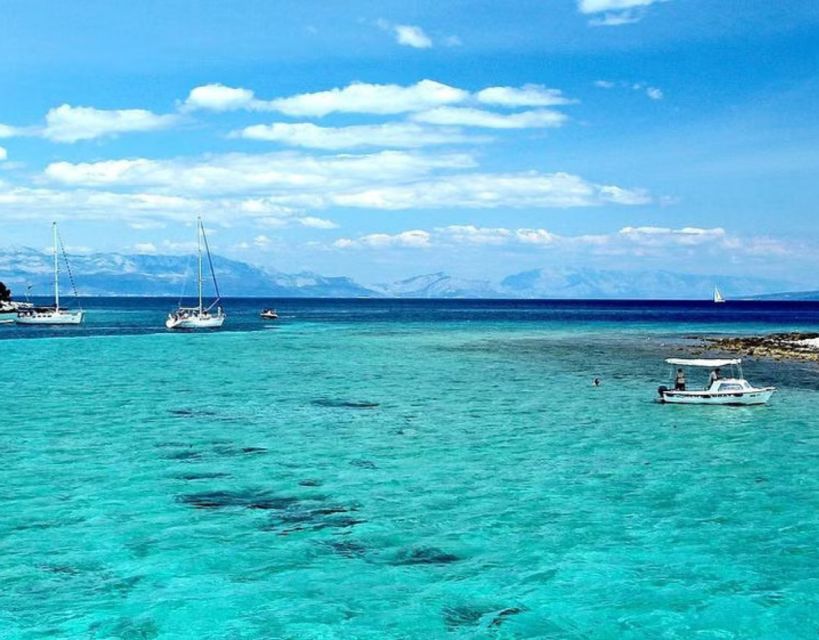 Split: Blue Lagoon Boat Trip with Lunch, Wine and Snorkeling - Leaving Split with the city behind you