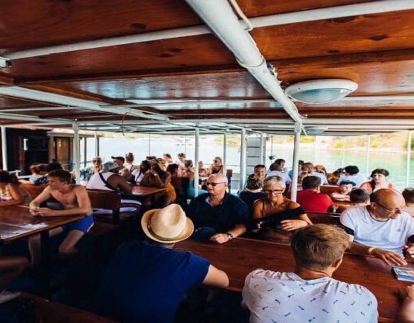 Split: Blue Lagoon Boat Trip with Lunch, Wine and Snorkeling - Lunch, wine, and the value of $91