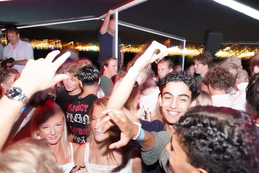 Split: Boat Crawl with Nightclub Access, Shots, & Boat Party - VIP nightclub access finishes the night
