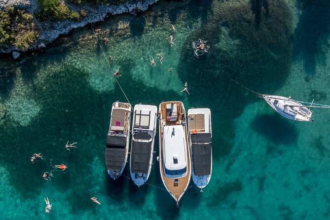 Split/Trogir: Blue Cave, Vis and Hvar Small Group Tour - Komiža gives the day a human scale