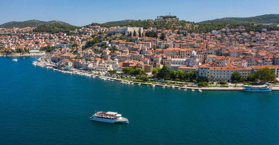 Vodice: Krka Waterfalls National Park Boat Tour - St Anthony Channel and the view toward Šibenik