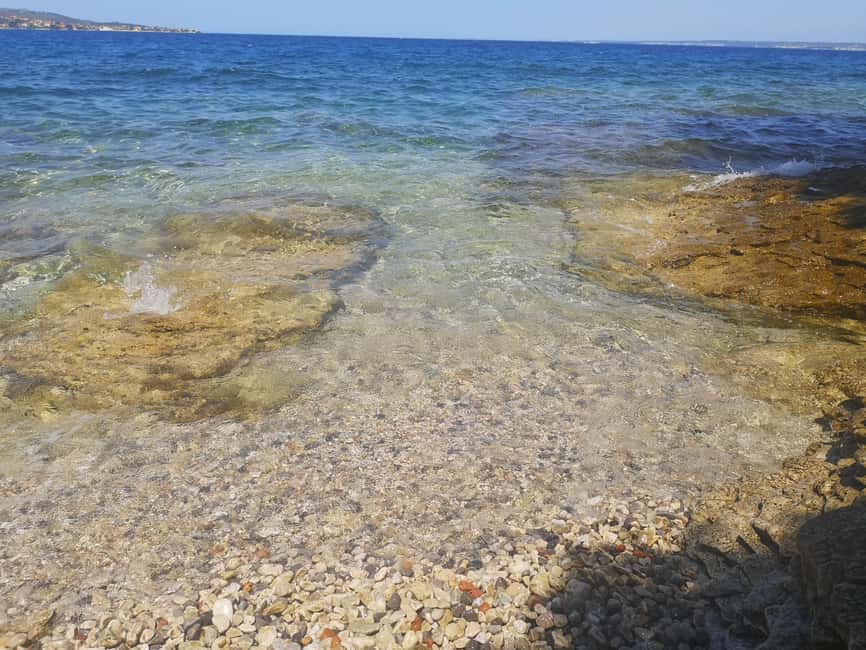 Zadar: 3-Stop Blue Lagoon & Snorkeling Cruise with Drinks - Stop two: a traditional Dalmatian island village