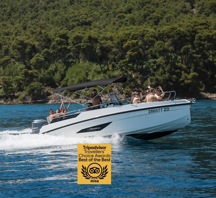 Zadar: Island Hopping Speedboat Adventure with Aperol Spritz - Stop one: a clear-water bay for swimming and snorkeling