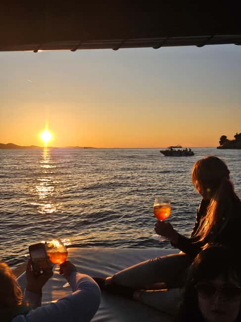Zadar: Sunset Boat Tour with Aperol Spritz - What the guide adds to the experience
