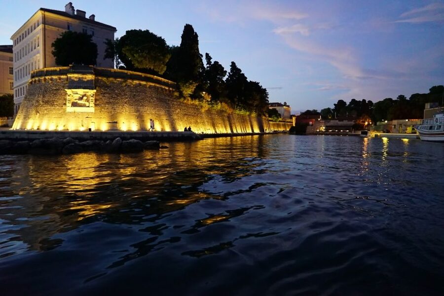 Zadar: Sunset & Nighttime Cruise with Sparkling Wine - Zadar Bridge by night and Uvala Jazine